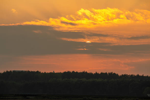 Sunset on an autumn evening sky near Woensdrecht in the Netherlands