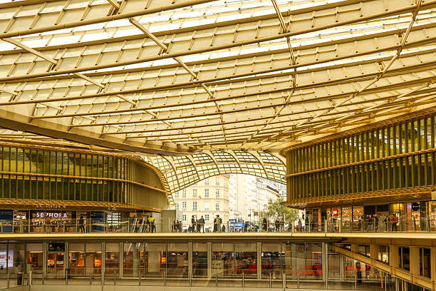 Paris, France - October 13, 2025: Modern canopy structure covering underground shopping mall in downtown paris, france, for shopping and travel