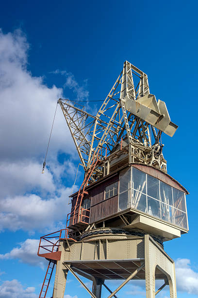 Tower crane engine room and control cabin in a port area.