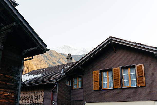 Grafenort, Engelberg Valley, Switzerland – A view of the historic Chalet House in Grafenort, situated in the Engelberg Valley. The photo shows the traditional Swiss alpine architecture set against the surrounding mountain landscape.