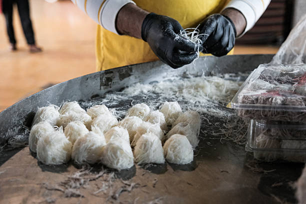 Traditional Turkish dessert Pismaniye. Pişmaniye balls ready for sale at the Ramadan event area.