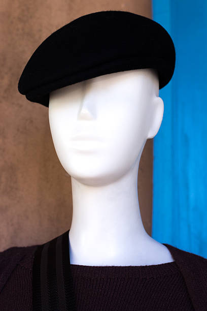 Mannequin Outside Shop Wearing Black Cap and Sweater Retail Display. Shot in Santa Fe, NM.