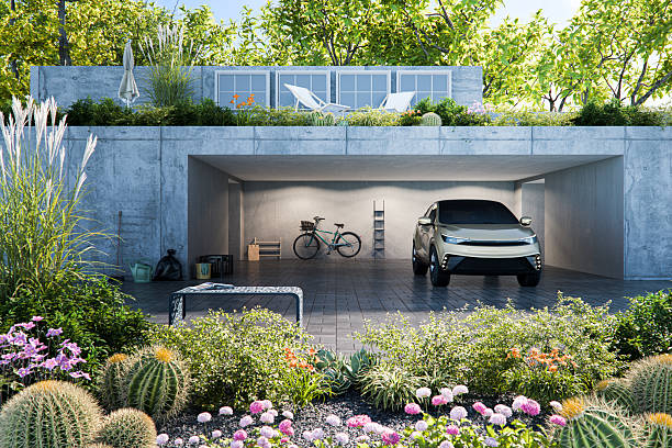 Modern concrete house with generic vehicle. 3D generated image. Car is generic and not based on any real (or concept) model/brand.