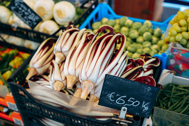 Fresh produce on display at local market in Italy during morning hours