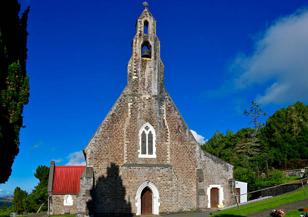 St Paul's, Saint Helena Island: Saint Paul’s Cathedral is a Grade I listed Anglican cathedral located approximately two miles south of Jamestown within the district of St Paul's on the island of Saint Helena. Designed by the London architect Benjamin Ferrey in the Gothic Revival style, constructed using a combination of local stone and imported English materials, the structure features pointed arches, and a central bellcote. Built between 1850 and 1851, it replaced the structurally failing \