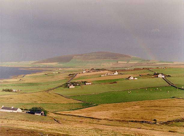 Orkney Islands, Scotland, year 1984, view from Wideford Hill with a rainbow.