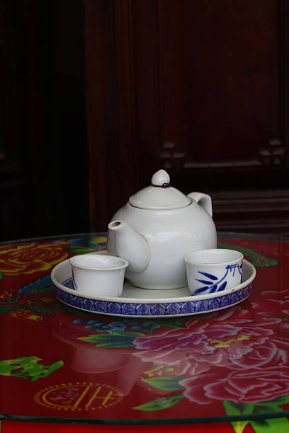 Chinese New Year Concept, Traditional Chinese Tea Set On Red Background.