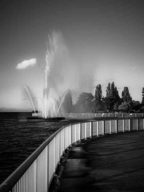 The Peace Fountain is located in a public park in Windsor, Ontario, Canada.  It is on the Detroit River.  Across the river is Detroit, Michigan, USA.