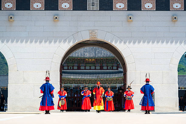 Seoul, South Kores - May, 19, 2024: The Changing of the Guard ceremony at the Gyeongbokgung Palace is a reenact of how it was done during the Joseon Dynasty. The royal palace guards were in charge of guarding the gates of the palace where the king resided.