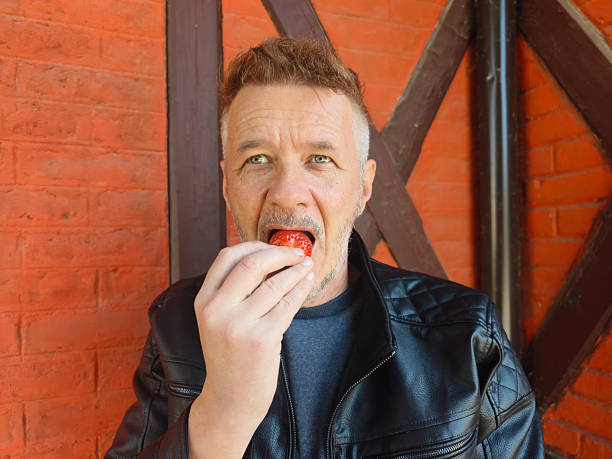 Eating juicy strawberries