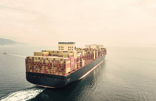 Aerial view of general cargo  ship in transit in Istanbul Bosphorus. Aerial view of freight ship.