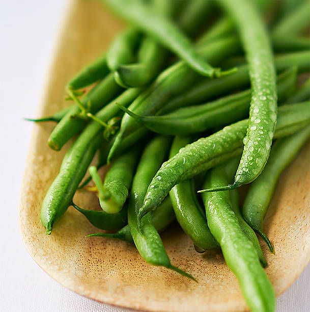 Fresh Green Beans on Wooden Dish