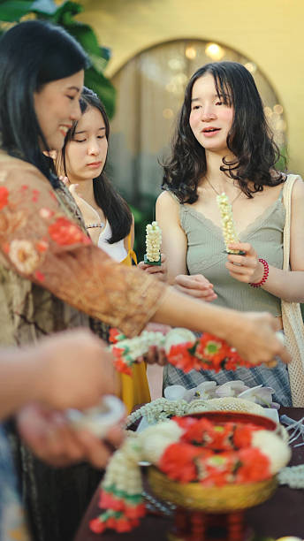Community lifestyle interaction within eco friendly leisure destination Friends socializing at outdoor tropical gathering during Thailand vacation, luxury travel lifestyle and Asian holiday celebration