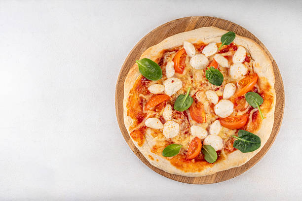 Easter pizza with bunny faces made with mozzarella cheese