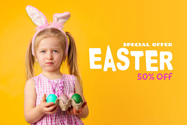 Happy Easter celebration with a child holding colorful eggs