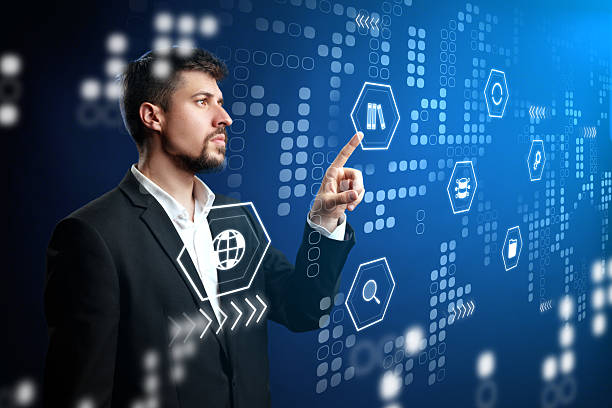 Person interacting with digital interface in a modern office setting during daytime hours