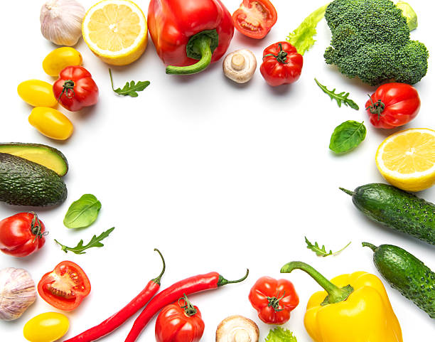 Fresh organic vegetables and fruits forming frame border