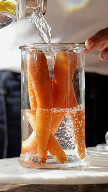 Preserving Fresh Organic Carrots in Glass Jars with Water – Natural Food Storage Method, Zero Waste Kitchen Practice and Sustainable Vegetable Preservation
