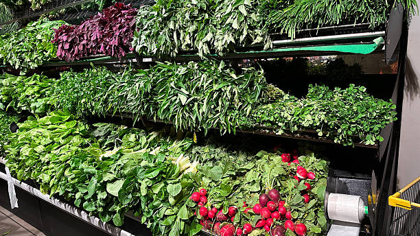 Fresh produce on display at a modern indoor market or grocery store