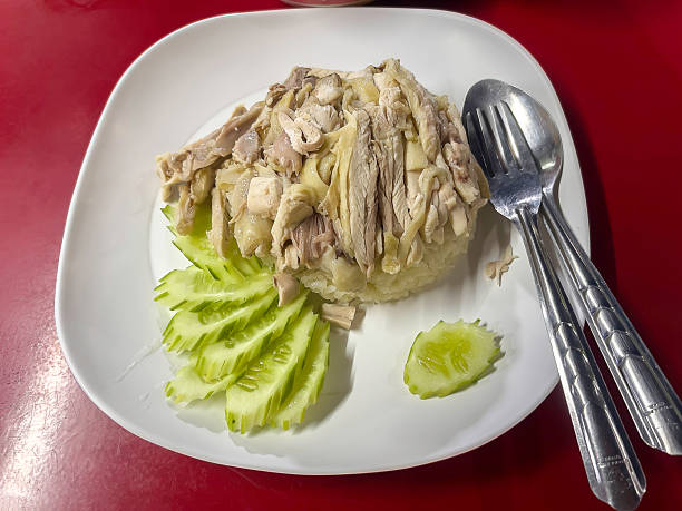 Steamed Rice Plate with Tender Chicken Slices Thai food Steamed rice topped with chicken