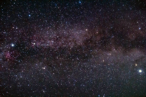 Constellations and Milky Way stars on a dark countryside skies.