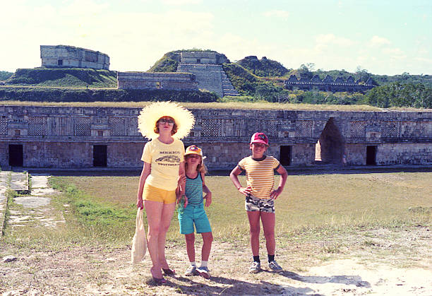 Vintage image of a mother and her children during a travle in Mexico.