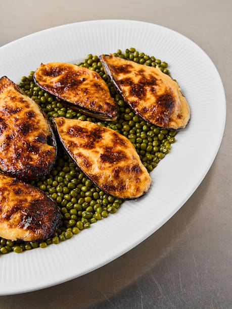 market fresh baked mussels on peas, sustainable seafood