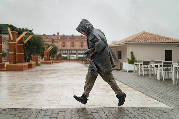 Man with a raincoat at Christ the King