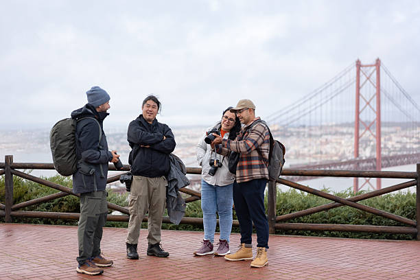 Tourists on the 25th of April Bridge