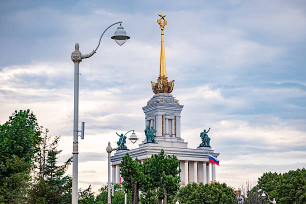 Golden spire and Soviet star on Russia's VDNH Pavilion 1, a landmark of Soviet architecture