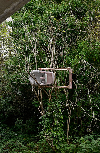 This high chair has been thrown from a bridge over the Rochdale canal in Chadderton. It is far more difficult to get to this bridge than it is to access a legitimate Household Waste Disposal Site.