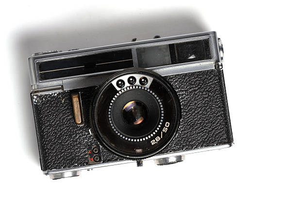 Vintage film camera isolated on white background