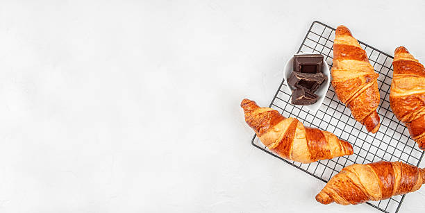 Croissants with Dark Chocolate on Cooling Rack