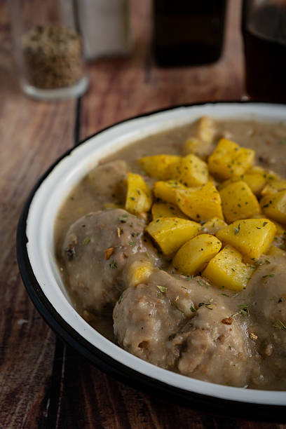 Meatballs and potatoes with almond sauce homemade dinner