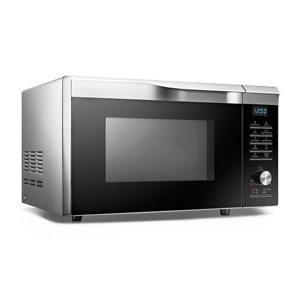 Microwave Oven Isolated on White Background. Side View of Modern Stainless Steel Over-the-Range Microwave Oven. Kitchen Appliances. Household Appliances. Clipping Path