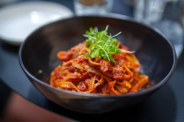 Slow Cooked Pork Ragout with Artisan Tagliatelle and Spicy Pomodoro