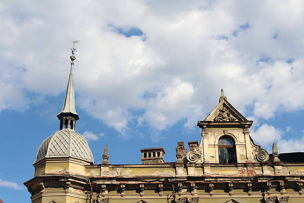 Ornamental rooftop of historic building August 2024 Decorative architecture and dome under blue sky