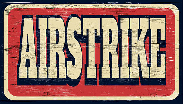 Aged and worn airstrike sign on wood