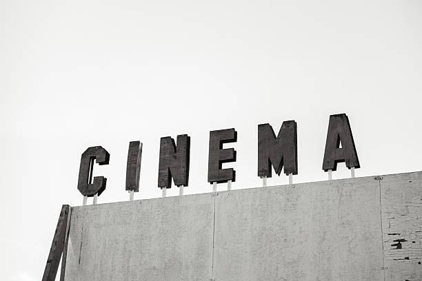 A minimalist, low-angle shot of black block letters spelling 