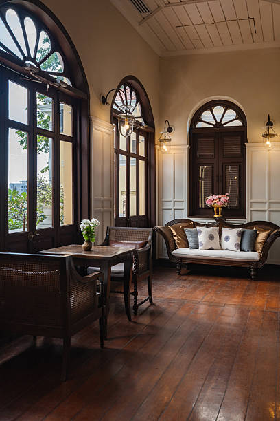 Interior view of a vintage colonial-style hotel lobby featuring classic architecture and elegant details.