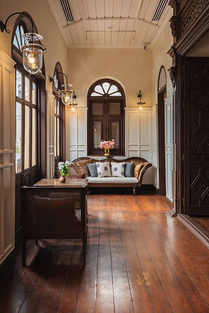 Interior view of a vintage colonial-style hotel lobby featuring classic architecture and elegant details.