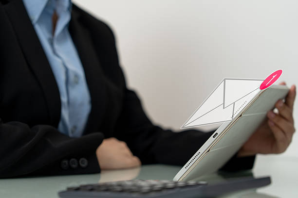Close-up, Hand of business woman using digital tablet to check e-mail or text message. double exposure or overlay.