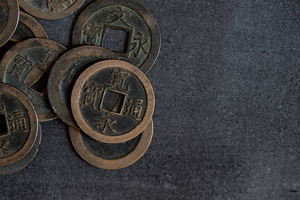 old-japanese-coins-on-a-black-