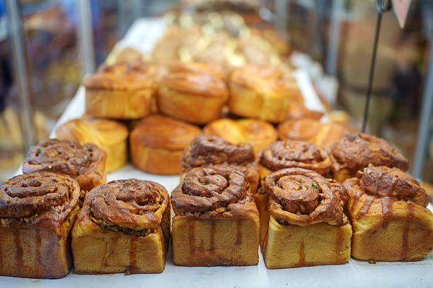 Freshly Baked Cinnamon Rolls and Pastries in Bakery Display