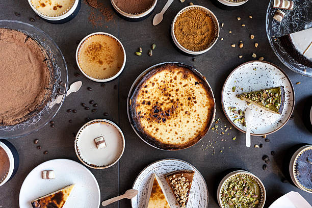 Burnt basque cheesecake and various sweet desserts flat lay