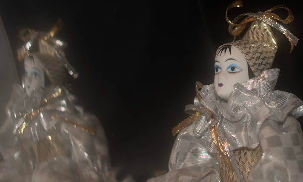 A hand-painted Harlequin porcelain figururine