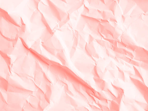 Paper crumpled pink background