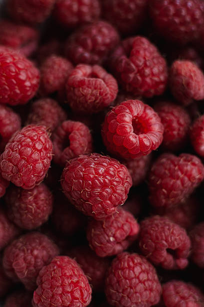Macro shot of fresh organic raspberries.
