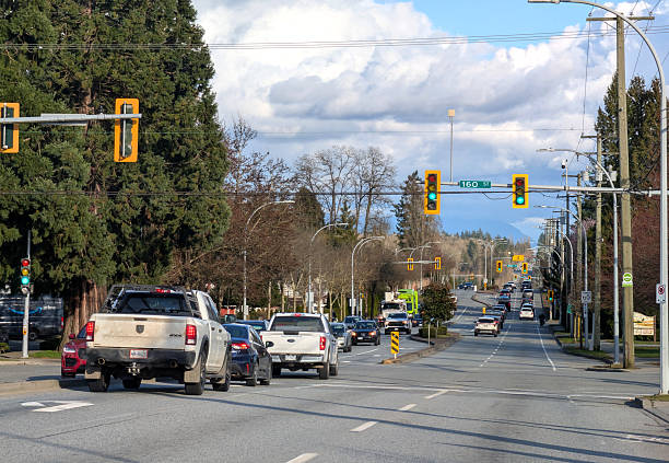 Surrey, Canada - March 9, 2026: Looking east on 96th Avenue in the Fleetwood-Tynehead neighbourhood. Mild winter afternoon with clouds over Metro Vancouver.