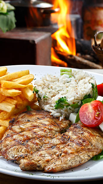 Rice, beans grilled chicken steak salad